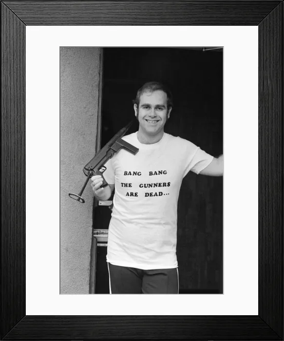 Framed Print : Pop star Elton John, also Chairman of Watford FC, pictured in Los Angeles giving his Framed Print : Pop star Elton John, also Chairman of Watford FC, pictured in Los Angeles giving his
