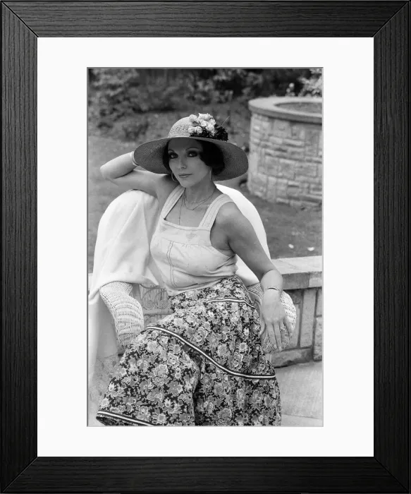 Framed Print : Actress Joan Collins modelling outfits that she will wear on a trip to Tokyo to judge a Framed Print : Actress Joan Collins modelling outfits that she will wear on a trip to Tokyo to judge a