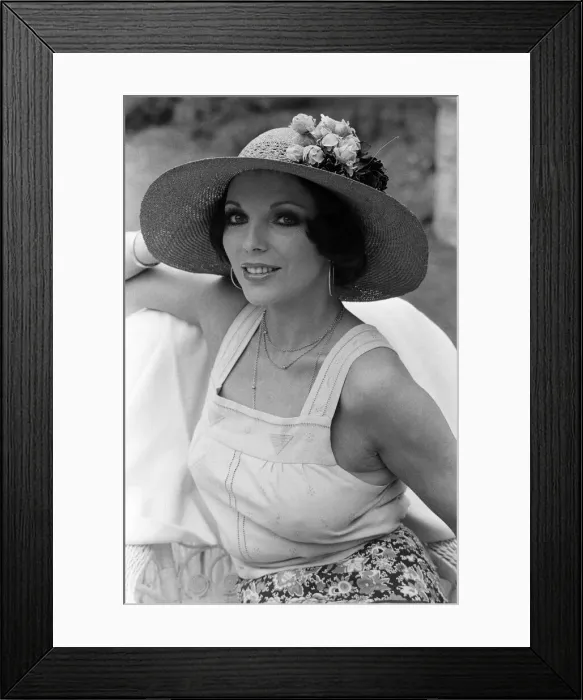 Framed Print : Actress Joan Collins modelling outfits that she will wear on a trip to Tokyo to judge a Framed Print : Actress Joan Collins modelling outfits that she will wear on a trip to Tokyo to judge a