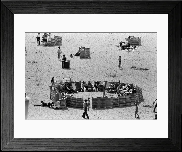 Framed Print : Beach scenes in Ramsgate. Holidaymakers in a village circle Framed Print : Beach scenes in Ramsgate. Holidaymakers in a village circle