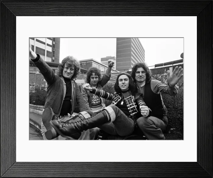 Framed Print : Glam rock group Slade posing for pictures in Birmingham City Centre. 25th March 1977 Framed Print : Glam rock group Slade posing for pictures in Birmingham City Centre. 25th March 1977