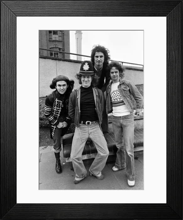 Framed Print : Glam rock group Slade posing for pictures in Birmingham City Centre. 25th March 1977 Framed Print : Glam rock group Slade posing for pictures in Birmingham City Centre. 25th March 1977
