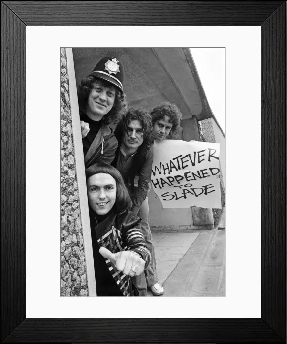 Framed Print : Glam rock group Slade posing for pictures in Birmingham City Centre. 25th March 1977 Framed Print : Glam rock group Slade posing for pictures in Birmingham City Centre. 25th March 1977