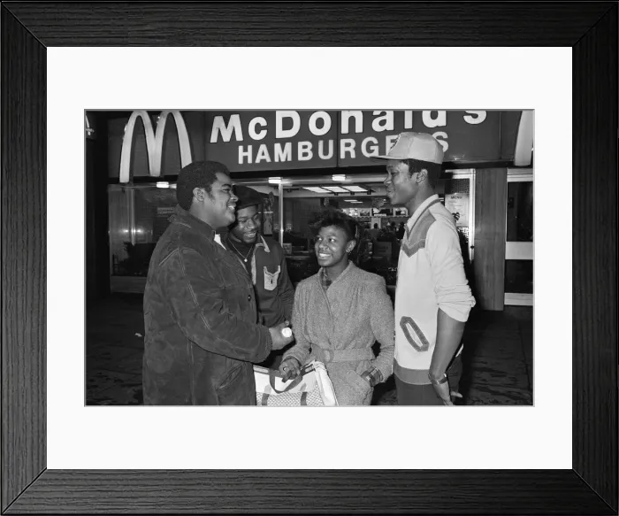 Framed Print : Young people standing outside McDonalds. 3rd April 1980 Framed Print : Young people standing outside McDonalds. 3rd April 1980
