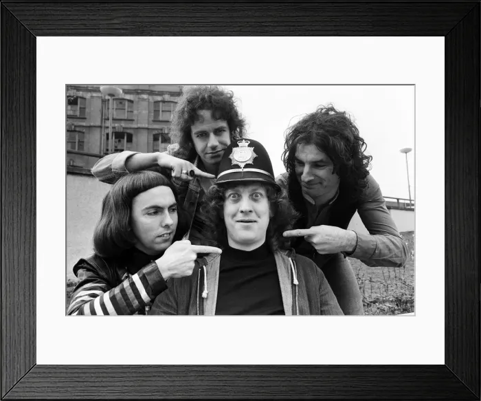 Framed Print : Glam rock group Slade posing for pictures in Birmingham City Centre. 25th March 1977 Framed Print : Glam rock group Slade posing for pictures in Birmingham City Centre. 25th March 1977