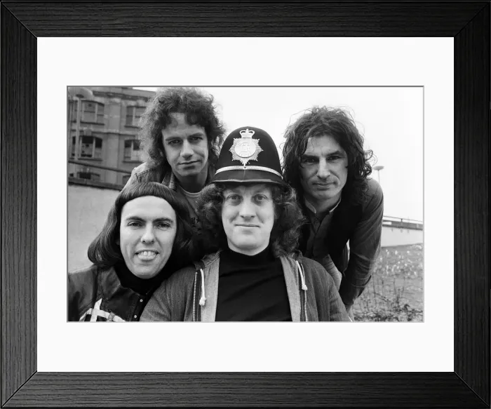 Framed Print : Glam rock group Slade posing for pictures in Birmingham City Centre. 25th March 1977 Framed Print : Glam rock group Slade posing for pictures in Birmingham City Centre. 25th March 1977