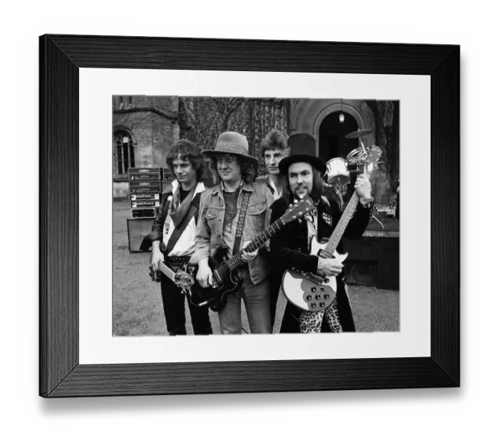 Framed Print : Slade (Dave Hill, Don Powell, Noddy Holder and Jim Lea) filming a new video at Eastnor