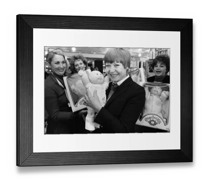 Framed Print : Cabbage Patch Dolls for sale in Harrods. Barbara Ericson from Dallas along with some