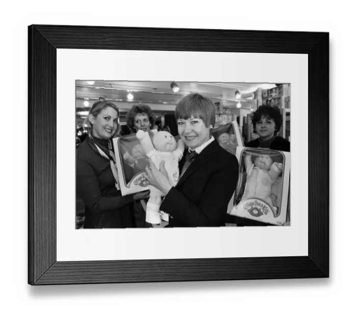 Framed Print : Cabbage Patch Dolls for sale in Harrods. Barbara Ericson from Dallas along with some