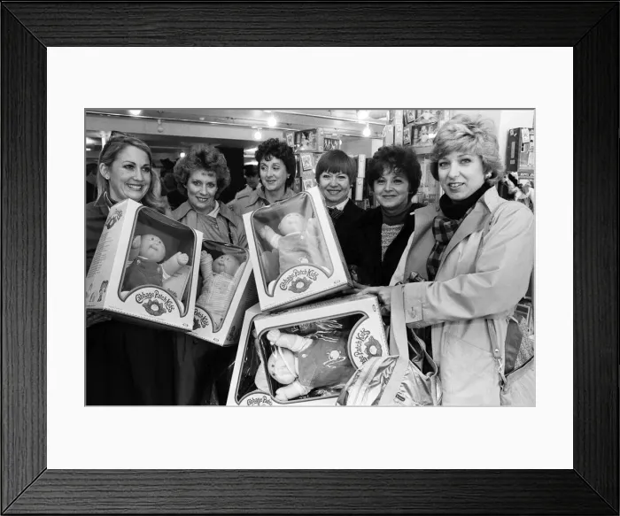 Framed Print : Cabbage Patch Dolls for sale in Harrods. Barbara Ericson from Dallas along with some