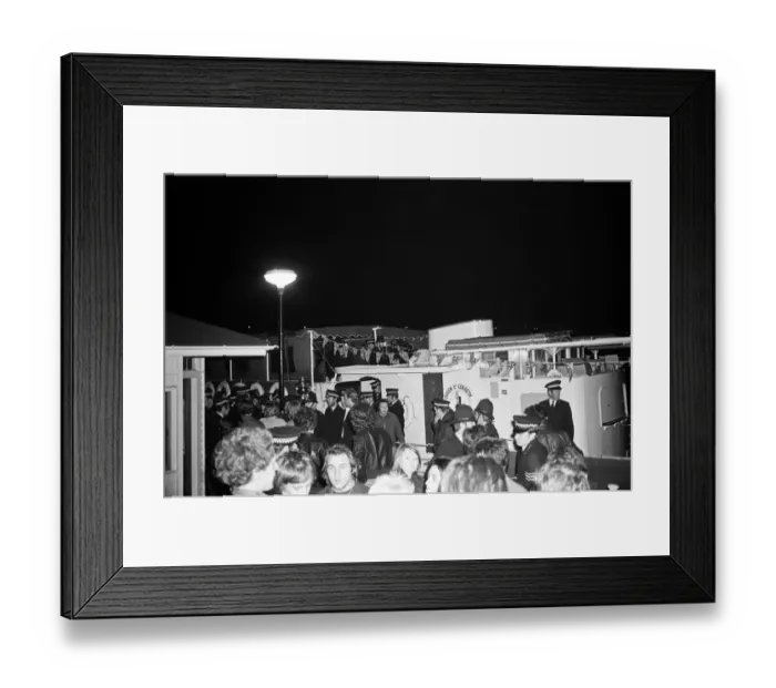 Framed Print : Sex Pistols Jubilee boat party on the Thames. Pictured, guests as they are taken away by Framed Print : Sex Pistols Jubilee boat party on the Thames. Pictured, guests as they are taken away by