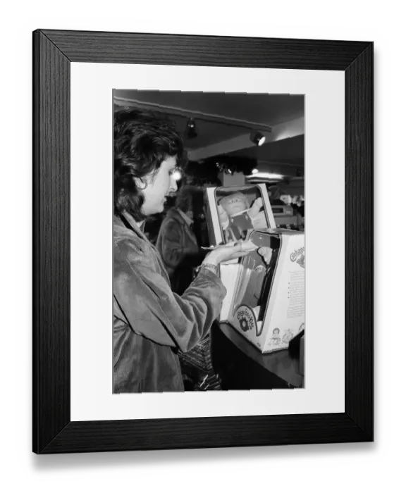 Framed Print : Cabbage Patch Dolls for sale in Harrods. One lucky customer buying two cabbage patch