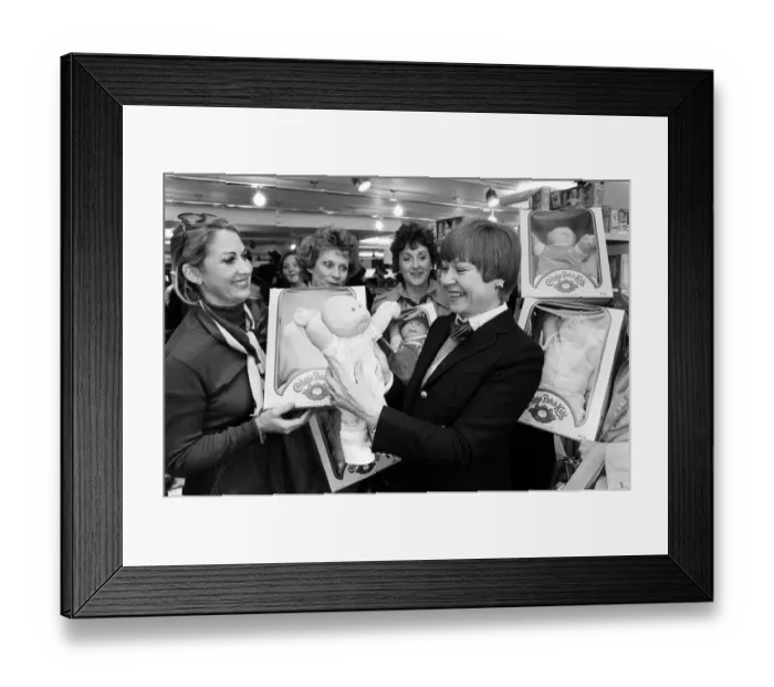 Framed Print : Cabbage Patch Dolls for sale in Harrods. Barbara Ericson from Dallas along with some