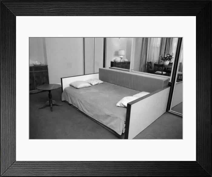 Framed Print : Interior view of a flat, showing the living room area and sofa bed. 29th October 1986 Framed Print : Interior view of a flat, showing the living room area and sofa bed. 29th October 1986