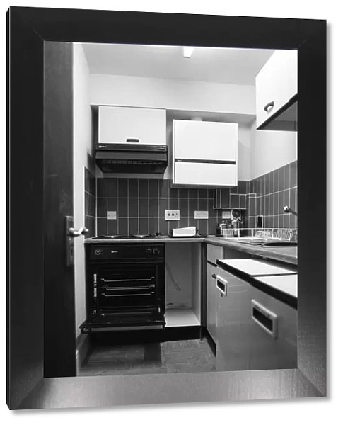 General view of a kitchen in a flat. 29th October 1986