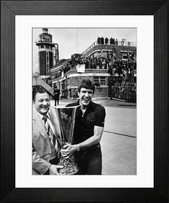 Framed Print : Liverpool return home with the UEFA Cup. Jubilant manager Bob Paisley Framed Print : Liverpool return home with the UEFA Cup. Jubilant manager Bob Paisley
