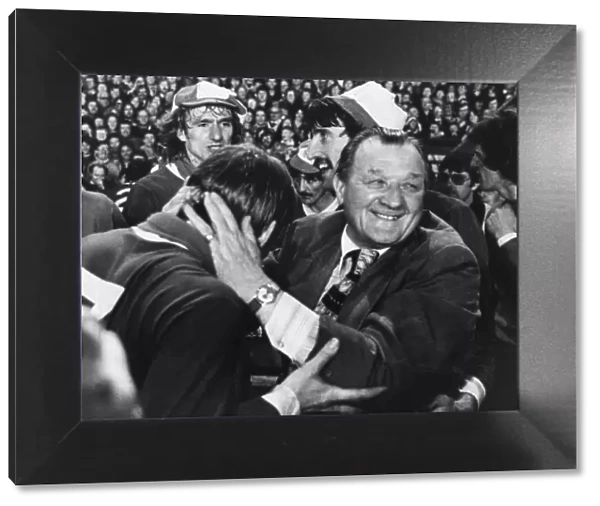 Liverpool manager Bob Paisley celebrates with Kenny Dalglish after clinching the title