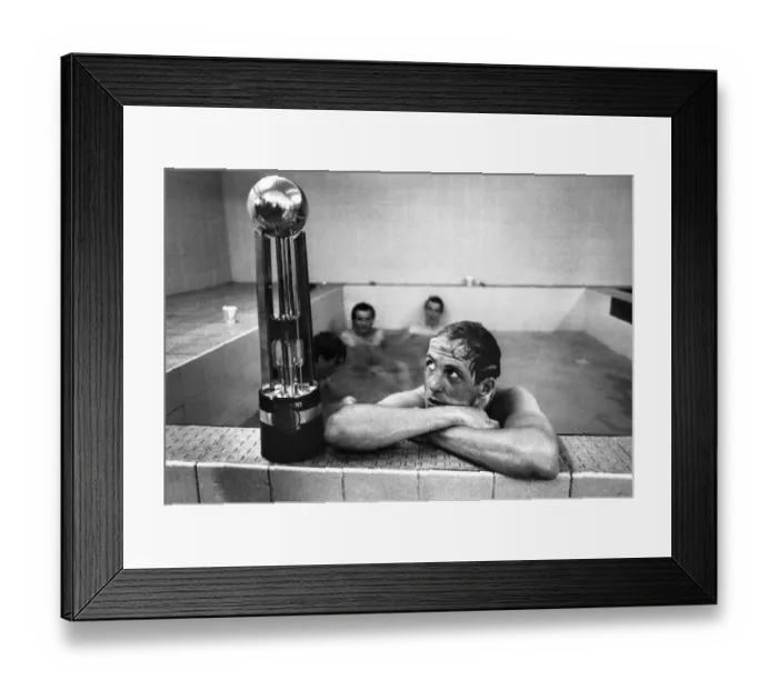 Framed Print : Phil Neal admires the Canon League trophy in the bath as Liverpool clinch another League Framed Print : Phil Neal admires the Canon League trophy in the bath as Liverpool clinch another League