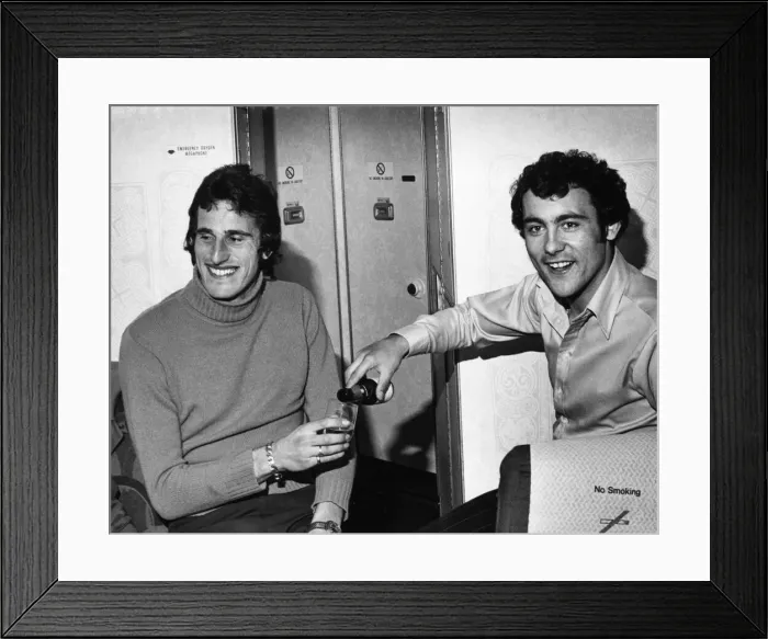 Framed Print : Ray Kennedy toasts hero goalkeeper Ray Clemence for his vital penalty save in the UEFA Framed Print : Ray Kennedy toasts hero goalkeeper Ray Clemence for his vital penalty save in the UEFA