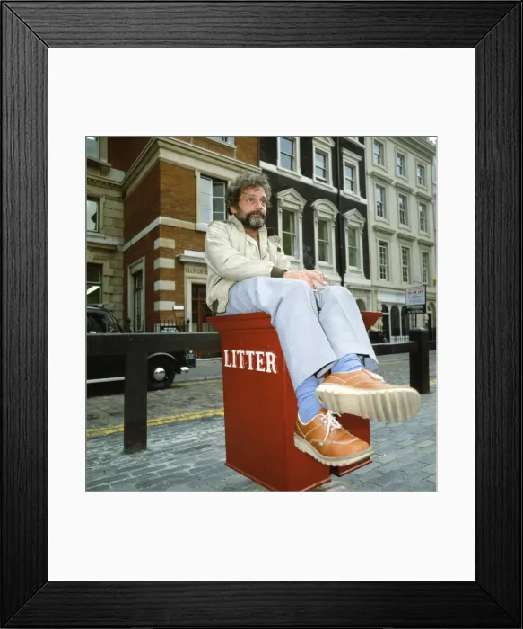 Framed Print : Actor David Jason pictured in Covent Garden, London, sitting on a litter bin. July 1985 Framed Print : Actor David Jason pictured in Covent Garden, London, sitting on a litter bin. July 1985
