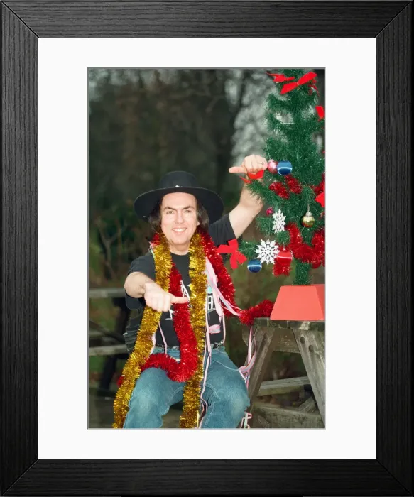 Framed Print : Dave Hill of the band Slade in festive mood. 12th December 1996 Framed Print : Dave Hill of the band Slade in festive mood. 12th December 1996