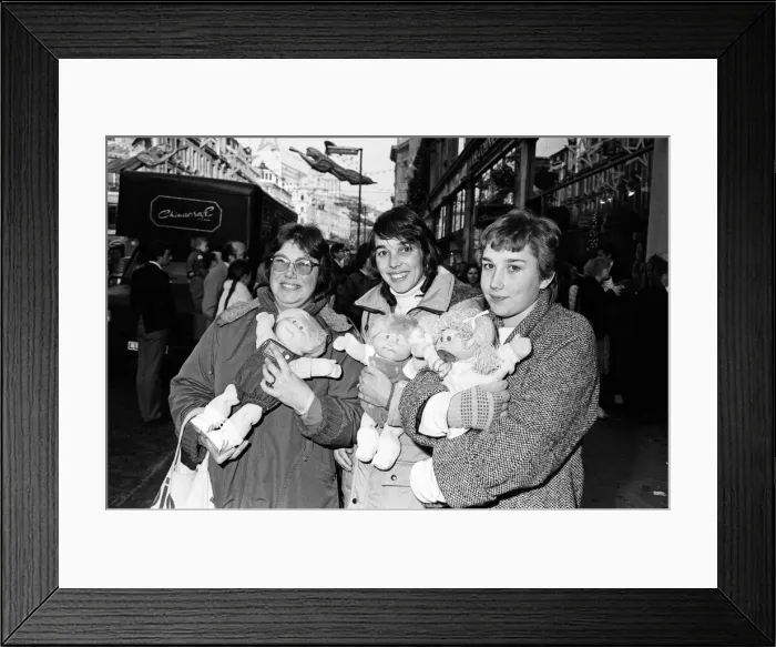 Framed Print : Cabbage Patch Dolls at Hamleys, top London toy store. Hundreds of people clamoured for