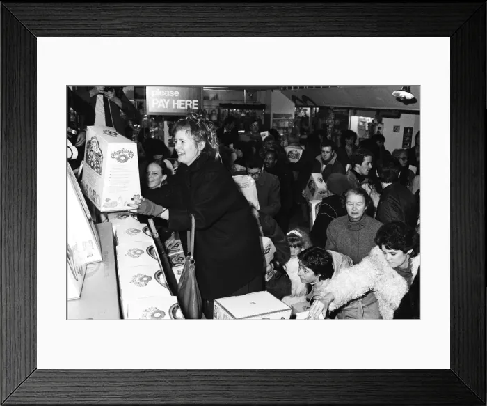 Framed Print : Cabbage Patch Dolls at Hamleys, top London toy store. Hundreds of people clamoured for Framed Print : Cabbage Patch Dolls at Hamleys, top London toy store. Hundreds of people clamoured for