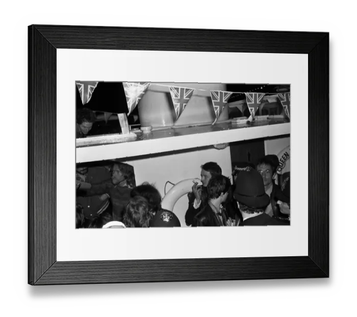 Framed Print : Sex Pistols Jubilee boat party on the Thames. Pictured, guests after the police forced Framed Print : Sex Pistols Jubilee boat party on the Thames. Pictured, guests after the police forced