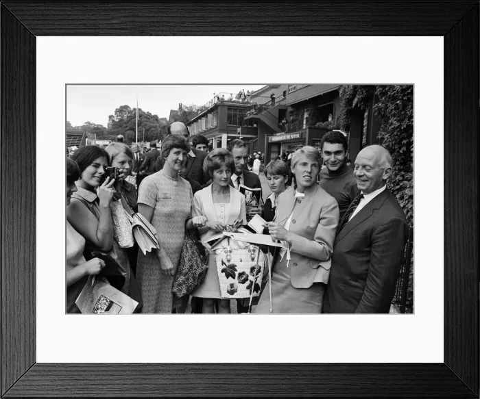 Framed Print : British Tennis player Ann Jones (3rd from right) signs autographs for her young fans Framed Print : British Tennis player Ann Jones (3rd from right) signs autographs for her young fans