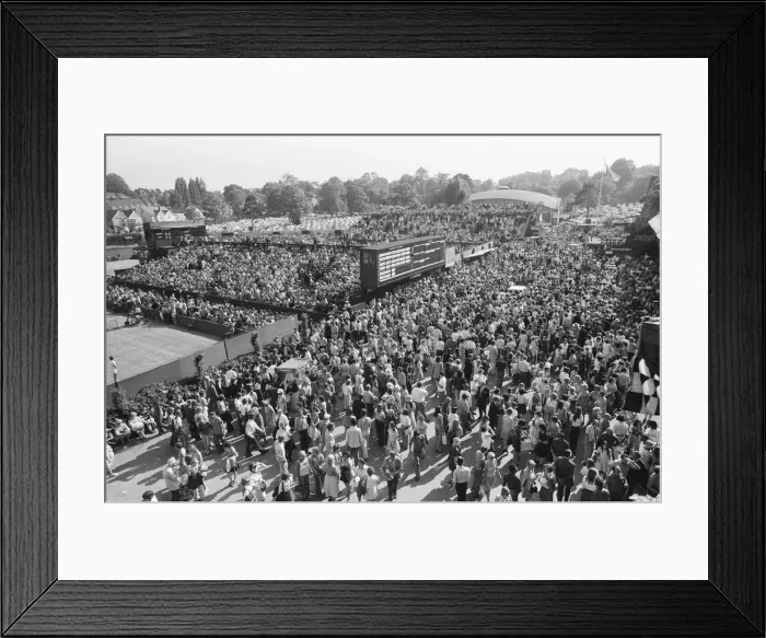 Framed Print : Wimbledon Tennis Championships. The huge crowd mill around the Tennis courts Framed Print : Wimbledon Tennis Championships. The huge crowd mill around the Tennis courts