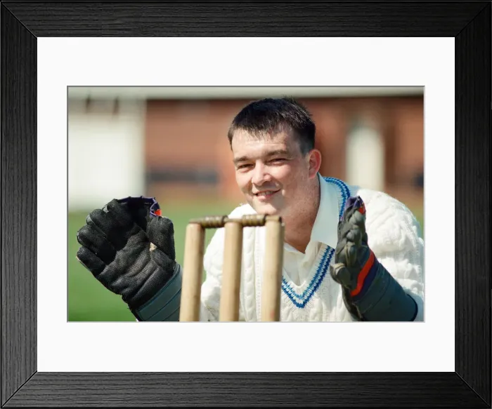 Framed Print : Anthony Matthews, who has one hand, keeps wicket for Stobswood Cricket Club