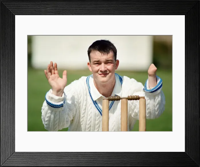 Framed Print : Anthony Matthews, who has one hand, keeps wicket for Stobswood Cricket Club