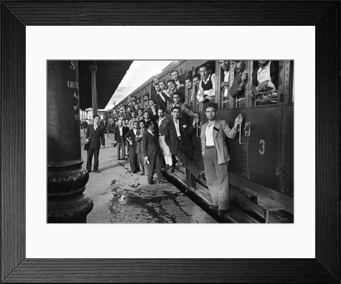 Framed Print : Scenes in Naples, southern Italy showing men arriving at the railway station Framed Print : Scenes in Naples, southern Italy showing men arriving at the railway station