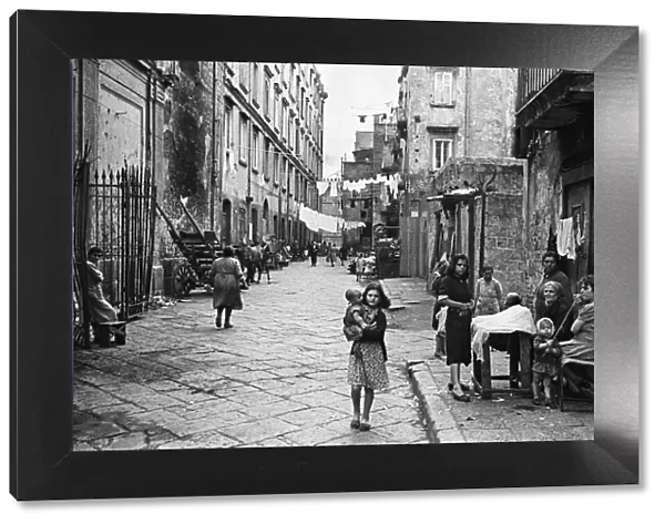 Scenes showing life for residents in a back street of Naples, southern Italy