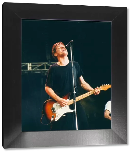 Bryan Adams performs at Cardiff Arms Park, Cardiff, Wales in 1992