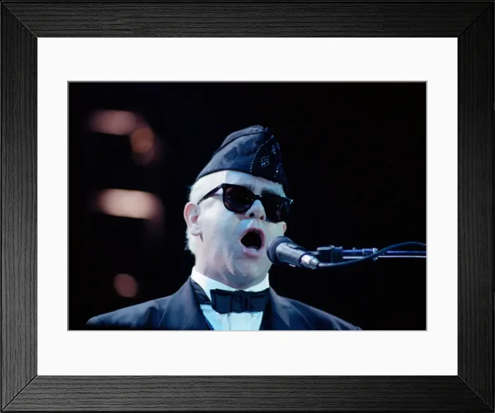 Framed Print : Elton John performing in concert in Paris during his Reg Strikes Back Tour Framed Print : Elton John performing in concert in Paris during his Reg Strikes Back Tour