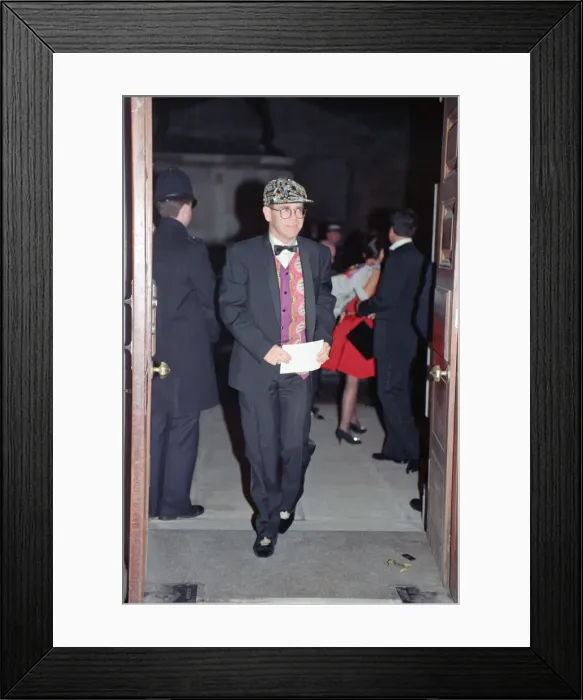 Framed Print : Elton John at a gala dinner in aid of the AIDS Crisis Trust in Whitehall Framed Print : Elton John at a gala dinner in aid of the AIDS Crisis Trust in Whitehall