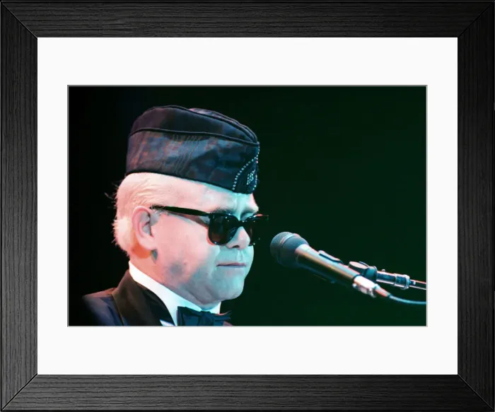 Framed Print : Elton John performing in concert in Paris during his Reg Strikes Back Tour Framed Print : Elton John performing in concert in Paris during his Reg Strikes Back Tour