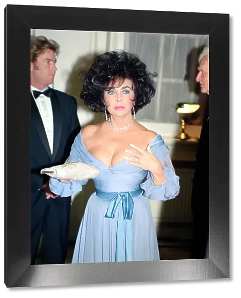 Elizabeth Taylor at a gala dinner in aid of the AIDS Crisis Trust in Whitehall