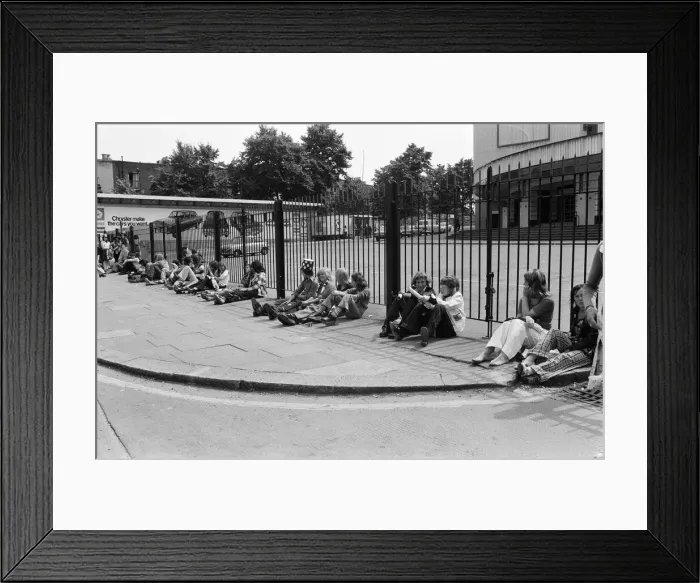 Framed Print : Fans of pop group Slade get ready for the invasion of Earls Court tonight where the group