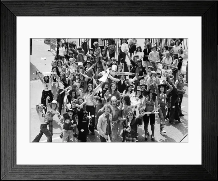 Framed Print : Fans of pop group Slade get ready for the invasion of Earls Court tonight where the group