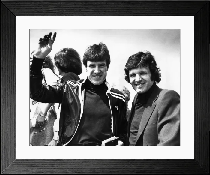 Framed Print : Liverpool player Emlyn Hughes boarding a flight, circa 1973 Framed Print : Liverpool player Emlyn Hughes boarding a flight, circa 1973