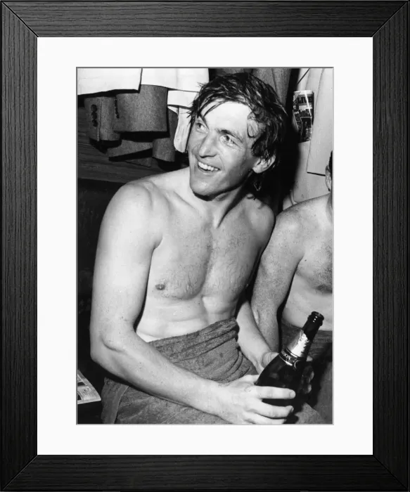 Framed Print : Kenny Dalglish celebrates with champagne in the dressing room Framed Print : Kenny Dalglish celebrates with champagne in the dressing room