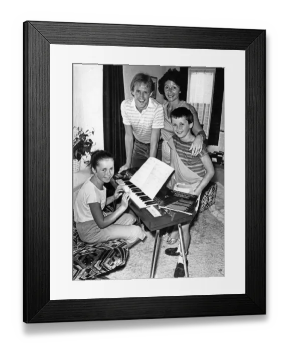Framed Print : Liverpool footballer Phil Neal with wife Sue and their children at home Framed Print : Liverpool footballer Phil Neal with wife Sue and their children at home