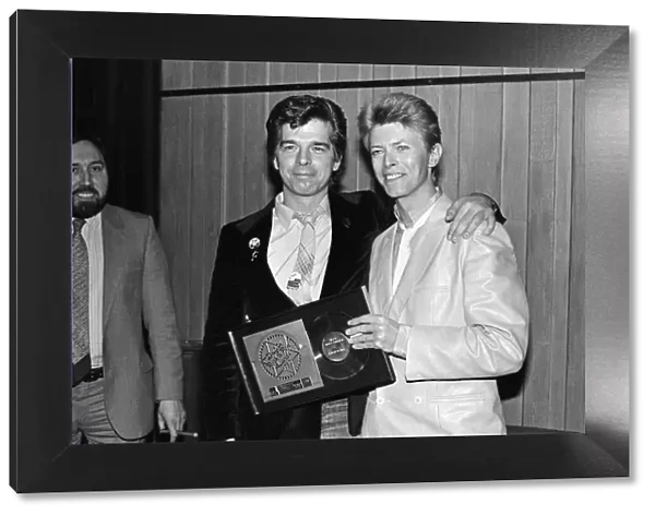 David Bowie (right) at the British Rock and Pop awards. He was named the best male singer