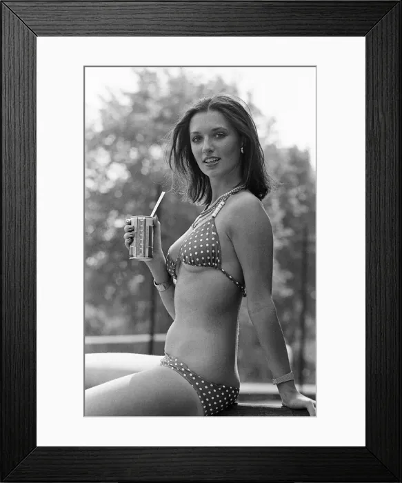 Framed Print : Young lady cools down with a refreshment as she enjoys the summer heatwave, Teesside Framed Print : Young lady cools down with a refreshment as she enjoys the summer heatwave, Teesside
