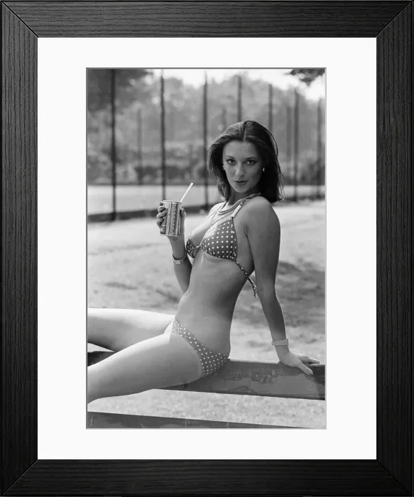 Framed Print : Young lady cools down with a refreshment as she enjoys the summer heatwave, Teesside Framed Print : Young lady cools down with a refreshment as she enjoys the summer heatwave, Teesside