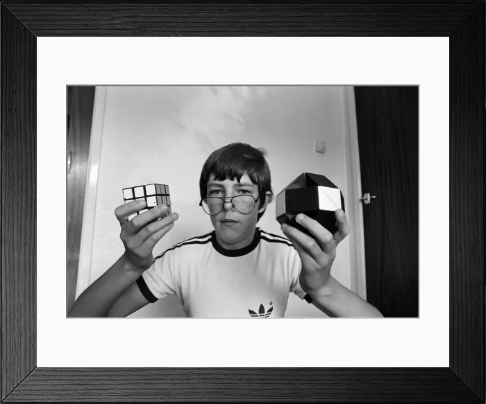 Framed Print : 14 year old Terence Wilson of Deepdale near Preston, with his Rubik cube and snake Framed Print : 14 year old Terence Wilson of Deepdale near Preston, with his Rubik cube and snake