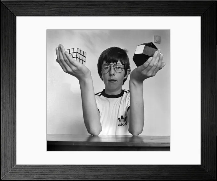Framed Print : 14 year old Terence Wilson of Deepdale near Preston, with his Rubik cube and snake Framed Print : 14 year old Terence Wilson of Deepdale near Preston, with his Rubik cube and snake