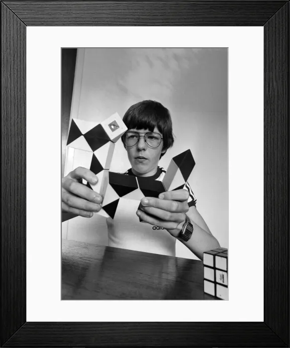 Framed Print : 14 year old Terence Wilson of Deepdale near Preston, with his Rubik cube and snake Framed Print : 14 year old Terence Wilson of Deepdale near Preston, with his Rubik cube and snake